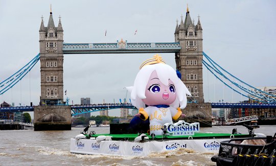LR - A 6-meter tall giant PAIMON, an animated character from Genshin Impact, embarked on a river drifting voyage on the River Thames.jpg