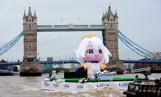 LR - A 6-meter tall giant PAIMON, an animated character from Genshin Impact, embarked on a river drifting voyage on the River Thames.jpg